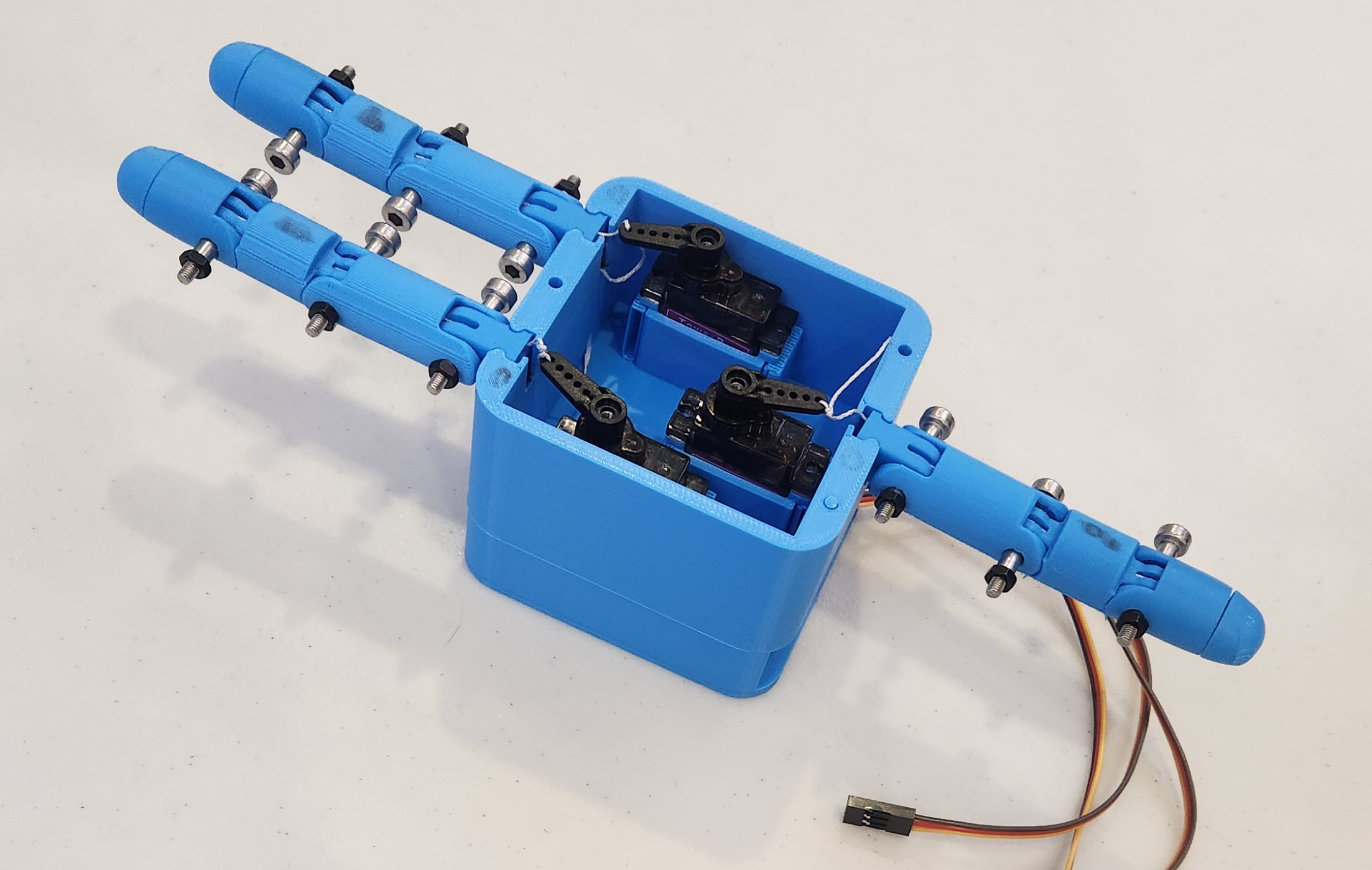 TITAN hand prototype with blue 3D printed fingers